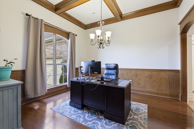 office space featuring a chandelier, beam ceiling, and coffered ceiling