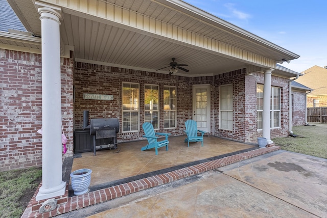 view of patio featuring ceiling fan and a grill