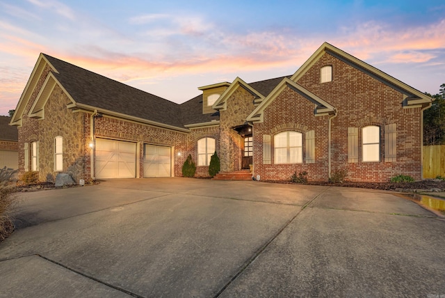 view of front of home with a garage