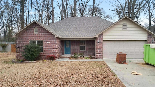 single story home featuring a garage