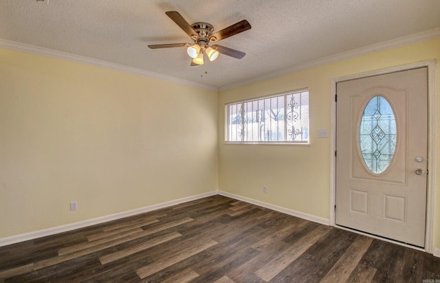 entryway featuring a textured ceiling, dark hardwood / wood-style floors, ceiling fan, and ornamental molding