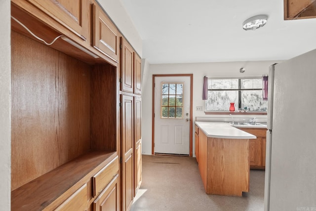 kitchen featuring a kitchen island and sink