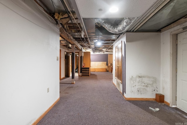 basement with carpet flooring