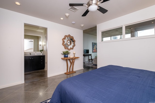 bedroom with connected bathroom and ceiling fan