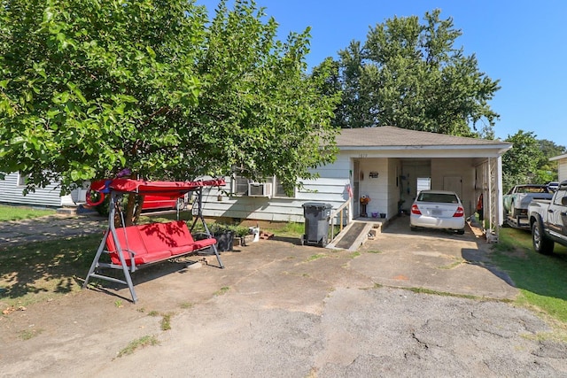 view of front facade featuring a carport