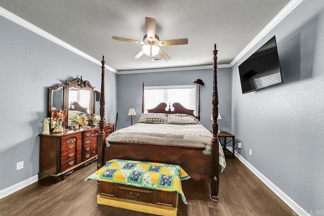 bedroom featuring a textured ceiling, dark hardwood / wood-style floors, ceiling fan, and crown molding