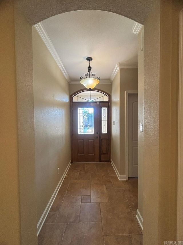 foyer entrance with ornamental molding