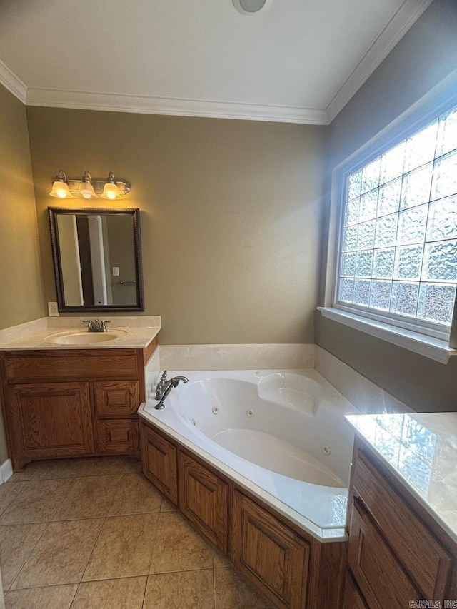 bathroom with vanity, tile patterned floors, a bathtub, and ornamental molding