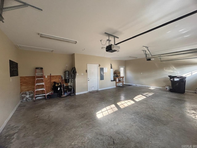 garage with electric panel and a garage door opener