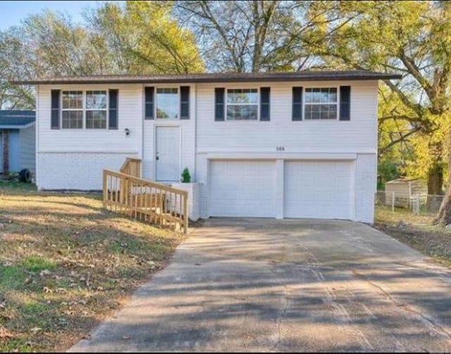 split foyer home featuring a garage