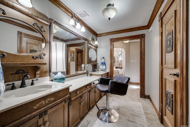 bathroom with vanity and ornamental molding