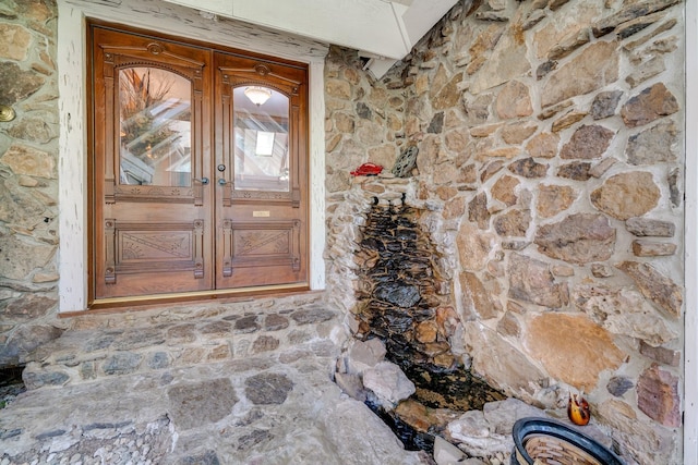 property entrance featuring french doors