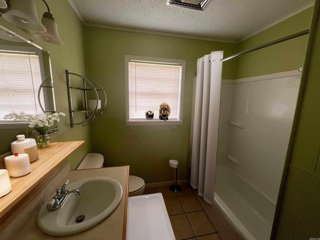 bathroom featuring tile patterned flooring, a shower with curtain, toilet, and sink