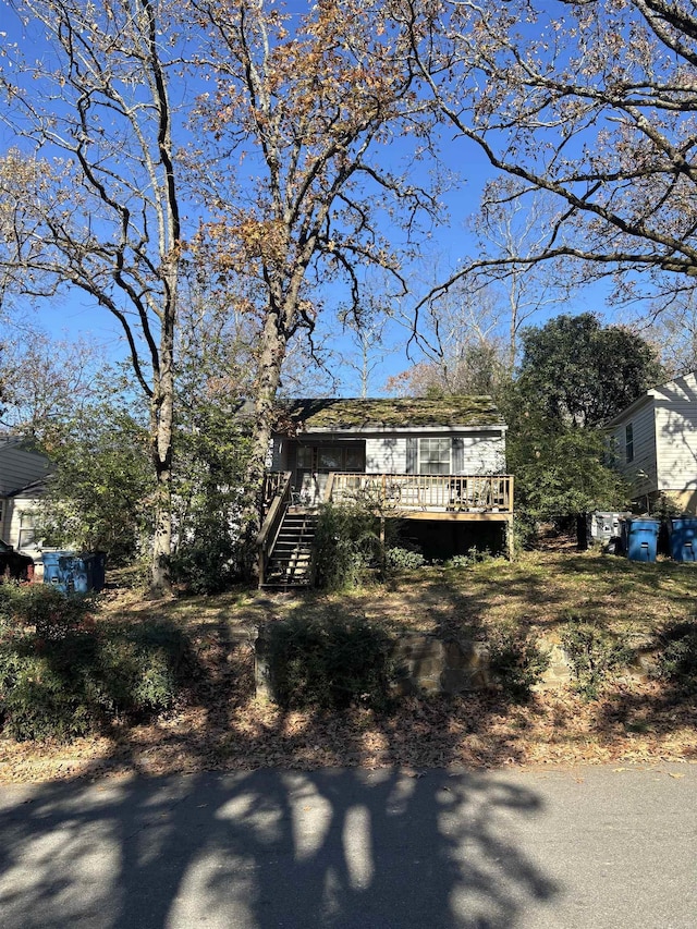 view of front of property featuring a deck