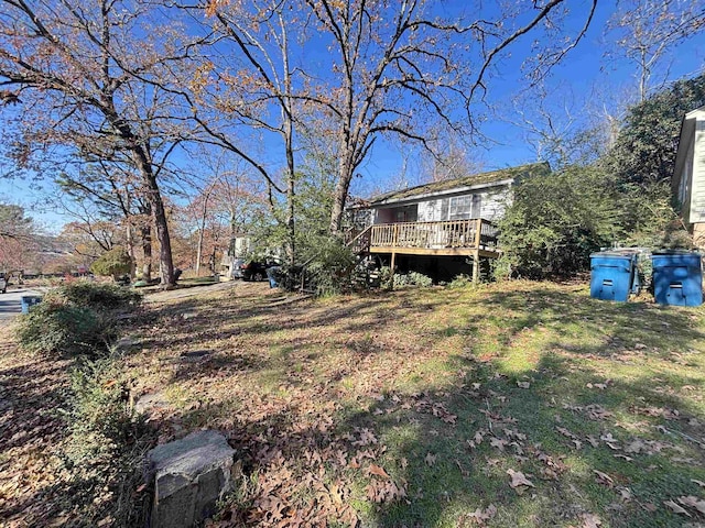 view of yard with a wooden deck