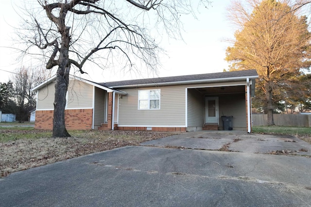 view of front of house with a carport