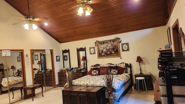 carpeted bedroom featuring ceiling fan, wooden ceiling, and high vaulted ceiling