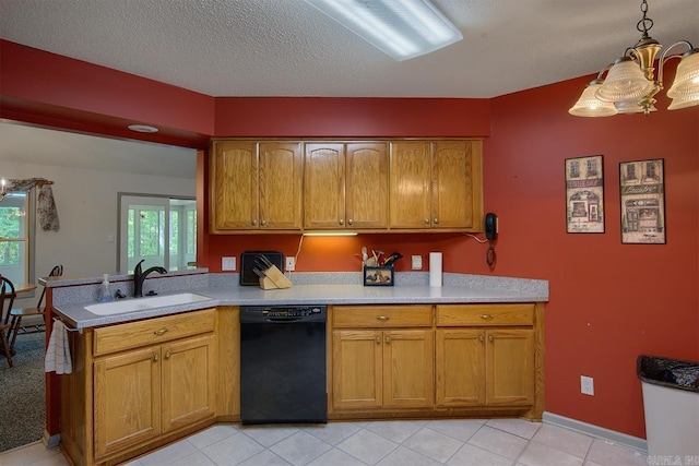 kitchen with pendant lighting, sink, black dishwasher, a textured ceiling, and a notable chandelier