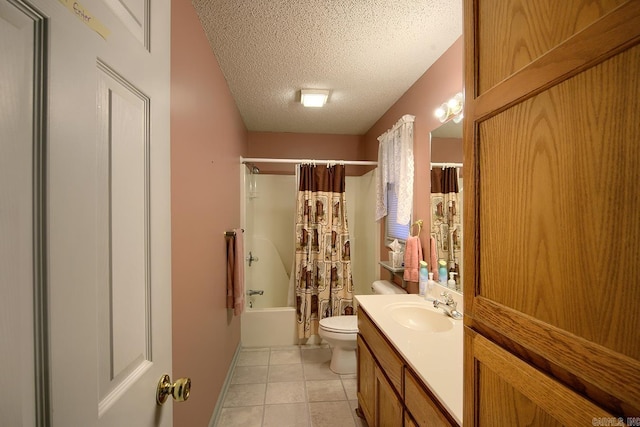 full bathroom featuring shower / bath combo, vanity, a textured ceiling, tile patterned flooring, and toilet