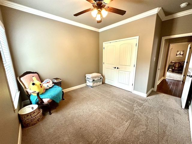 unfurnished room featuring ceiling fan, light colored carpet, and ornamental molding