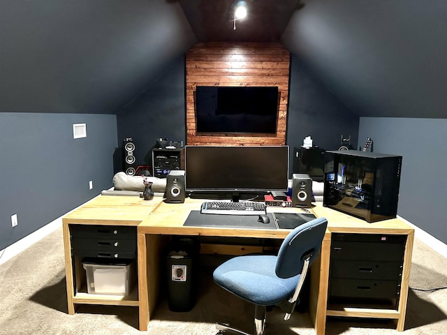 office space featuring carpet floors and vaulted ceiling