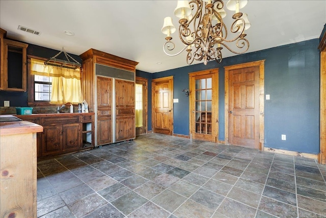 kitchen with an inviting chandelier