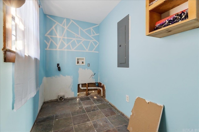 laundry room featuring electric panel, hookup for a washing machine, and hookup for an electric dryer