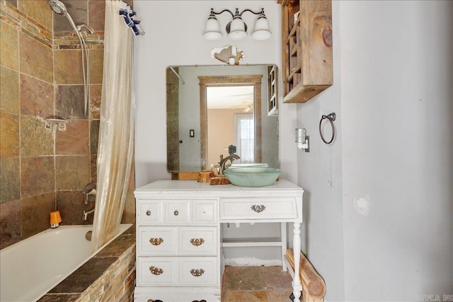 bathroom with shower / bath combination with curtain and vanity