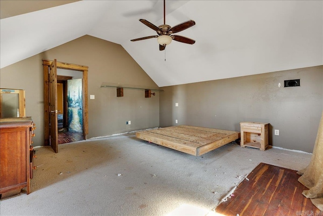 interior space with ceiling fan and lofted ceiling