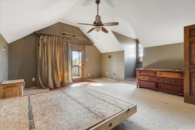 additional living space featuring ceiling fan and lofted ceiling