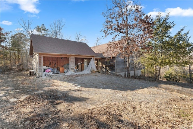 exterior space with an outbuilding