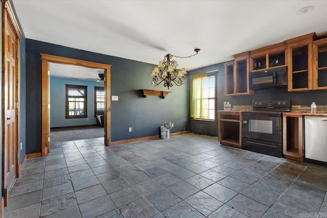 kitchen with black appliances, plenty of natural light, and ceiling fan with notable chandelier