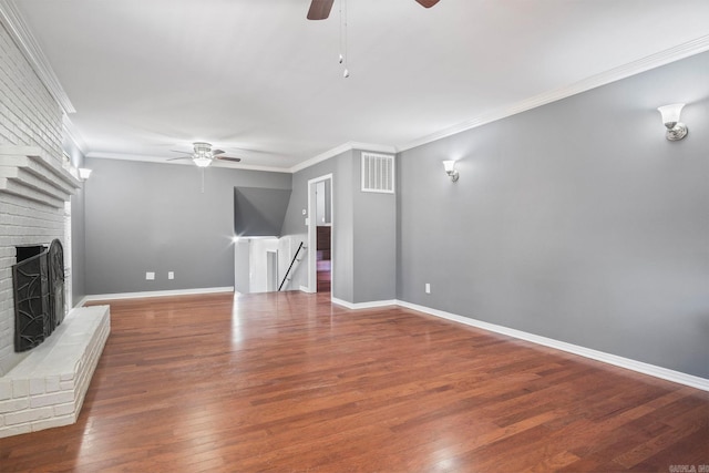 unfurnished living room with crown molding, a fireplace, ceiling fan, and hardwood / wood-style flooring