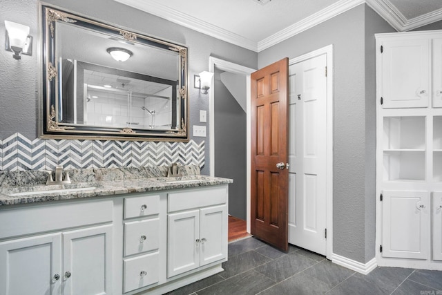 bathroom featuring vanity, tile patterned floors, decorative backsplash, ornamental molding, and walk in shower