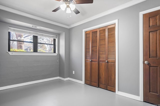 unfurnished bedroom with a closet, ceiling fan, and ornamental molding