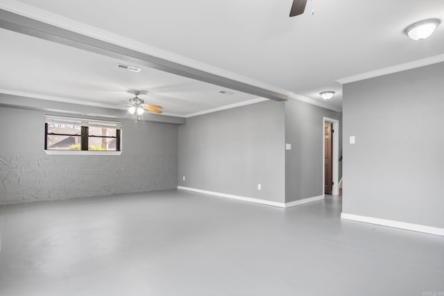 unfurnished room featuring concrete floors and ornamental molding