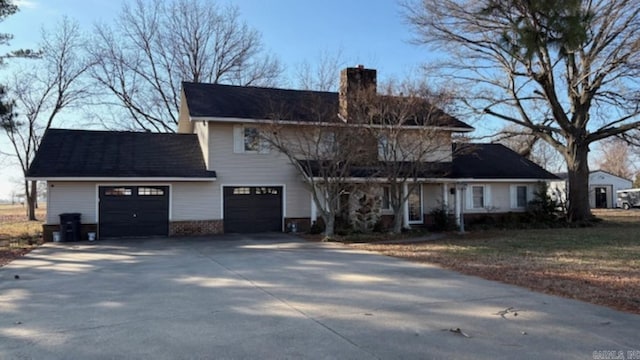 front of property featuring a garage