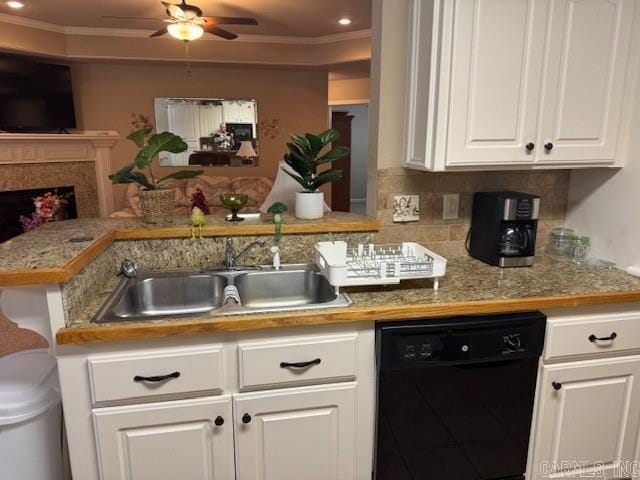 kitchen featuring backsplash, sink, ornamental molding, black dishwasher, and white cabinetry