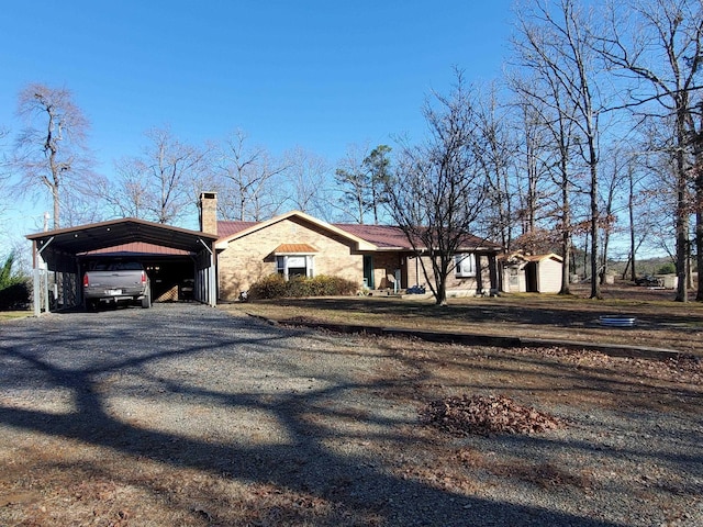 view of front of property with a carport