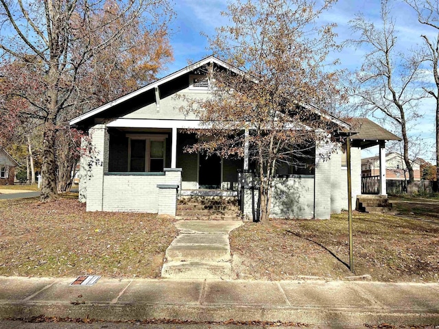 bungalow-style house featuring a porch