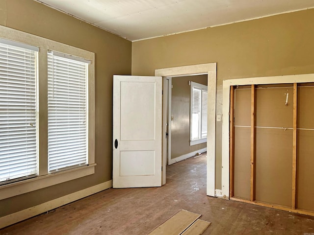 unfurnished bedroom with a closet