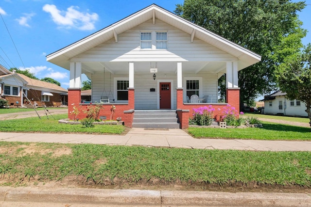 bungalow with a front lawn