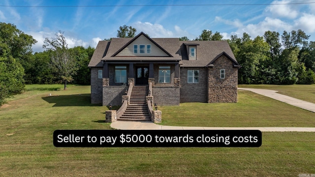 craftsman-style home with a front lawn