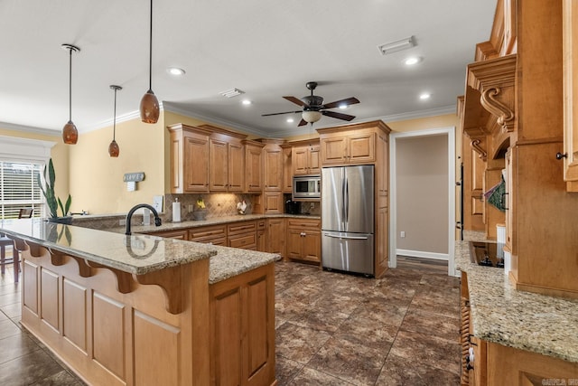 kitchen with kitchen peninsula, decorative backsplash, stainless steel appliances, ceiling fan, and hanging light fixtures