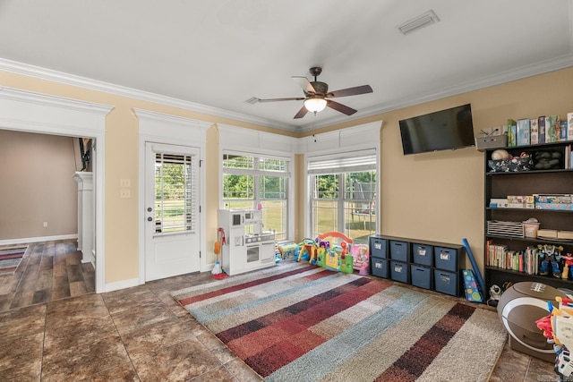 rec room featuring ceiling fan and ornamental molding