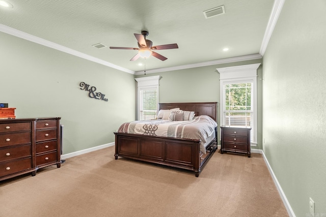 carpeted bedroom with ceiling fan, crown molding, and multiple windows