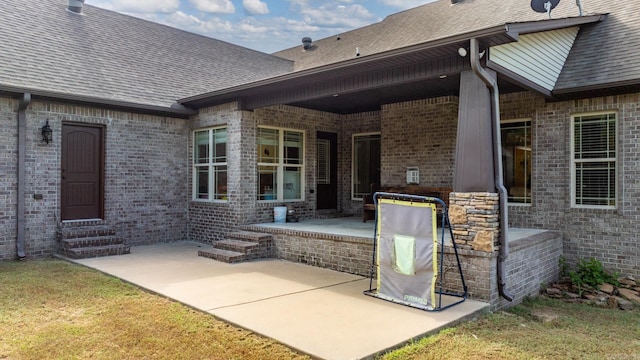 property entrance with a patio