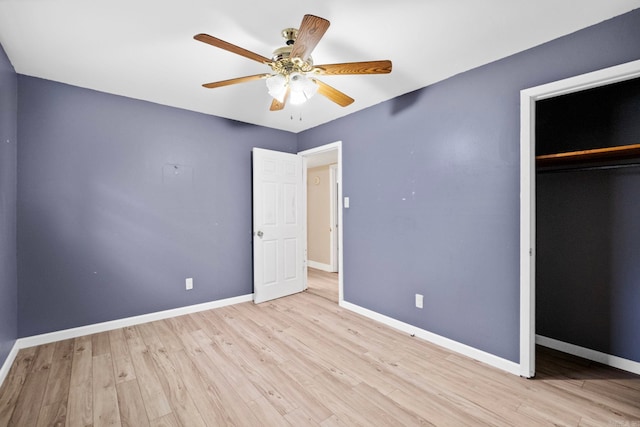 unfurnished bedroom featuring a closet, ceiling fan, and light hardwood / wood-style floors