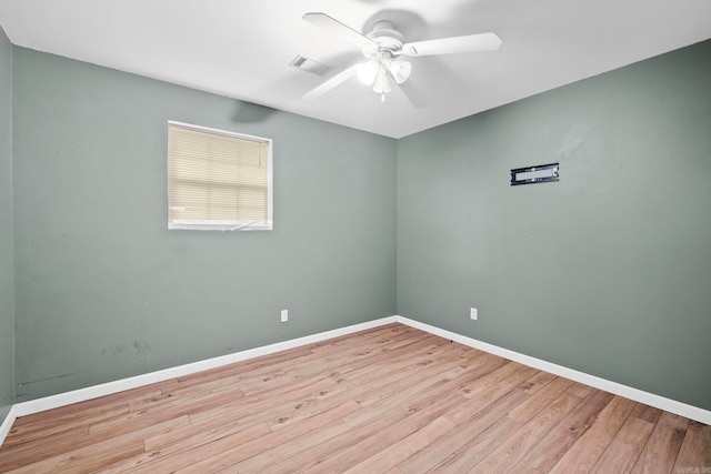 unfurnished room featuring ceiling fan and light hardwood / wood-style flooring