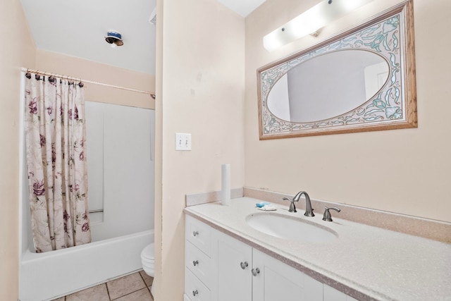 full bathroom with toilet, shower / bath combo, vanity, and tile patterned floors